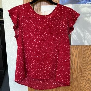 Red, polka dot blouse